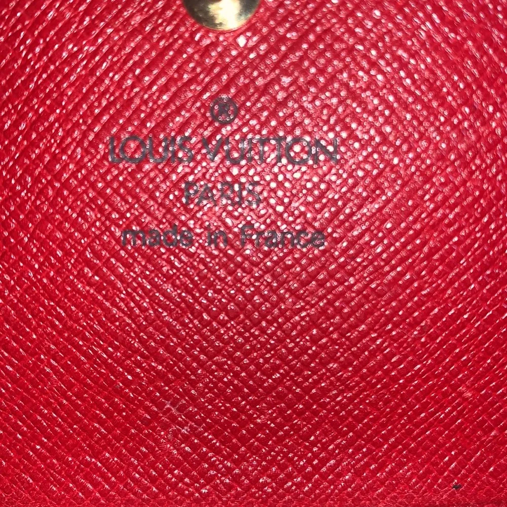Louis Vuitton Porte tresor Epi leather wallet